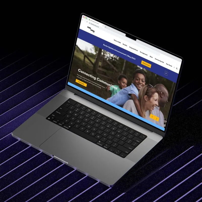 EWR web desktop homepage displayed on a macbook pro on an angle.